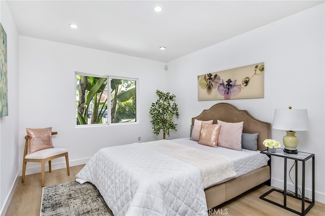 bedroom featuring light hardwood / wood-style floors