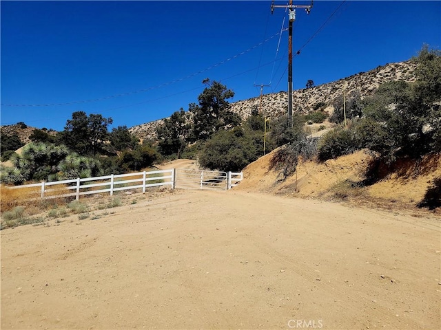 exterior space with a mountain view and a rural view