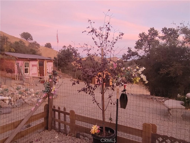 3131 Whispering Pines Rd, Wrightwood, CA 92397 - view of property exterior at dusk