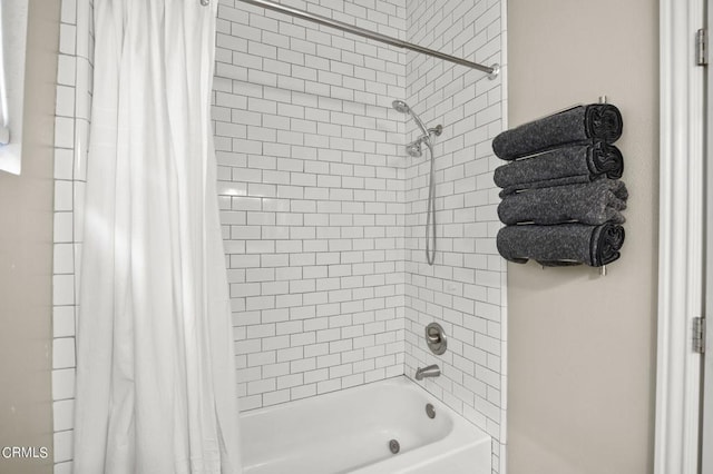 bathroom with shower / tub combo