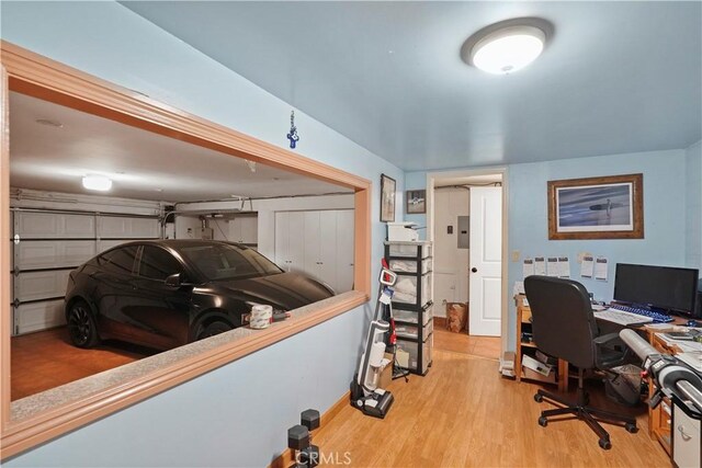 office space with light wood-type flooring