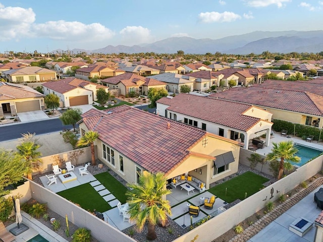 bird's eye view with a mountain view