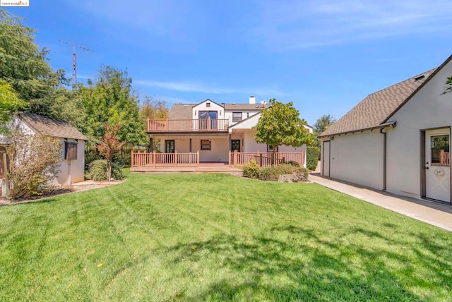 view of yard featuring a wooden deck