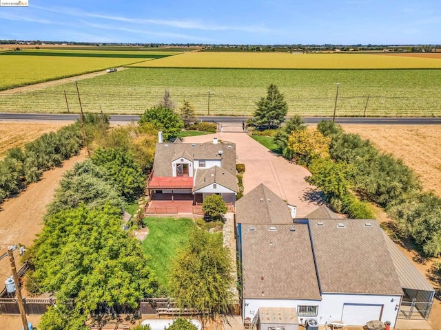 birds eye view of property featuring a rural view