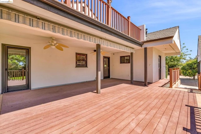 wooden terrace with ceiling fan