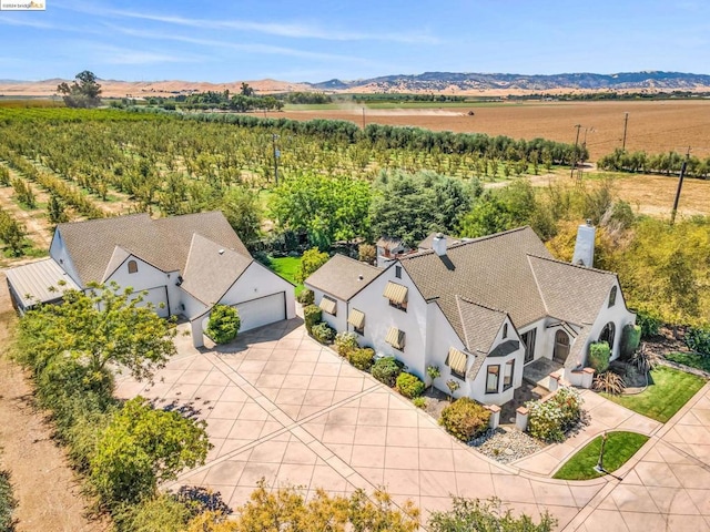 drone / aerial view featuring a mountain view