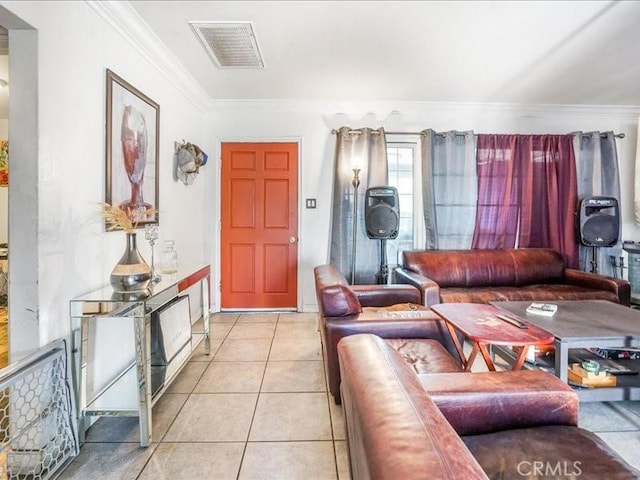 living room featuring ornamental molding and light tile patterned flooring