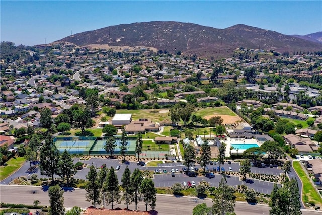 drone / aerial view featuring a mountain view