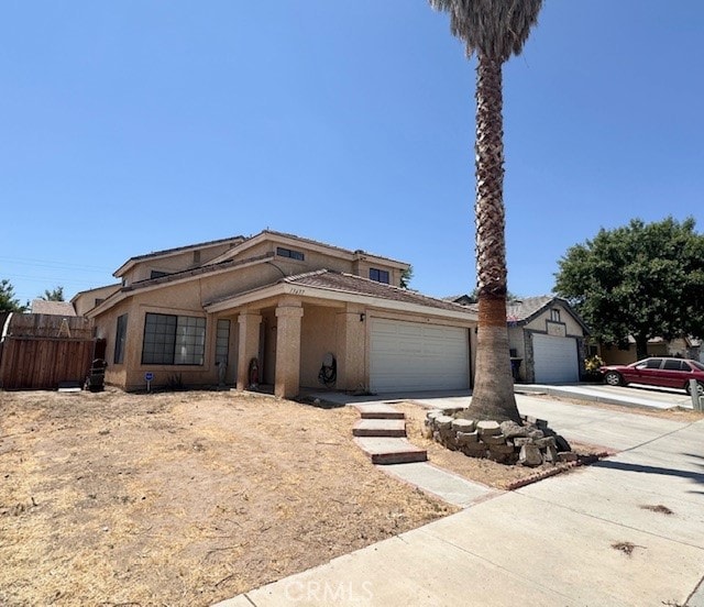 view of front of home with a garage