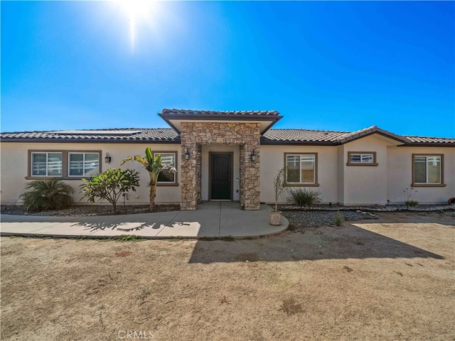 view of mediterranean / spanish house