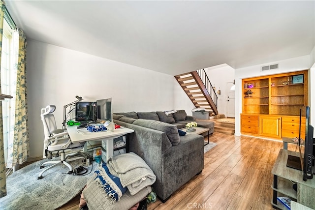 living room with hardwood / wood-style flooring