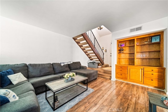 living room with light hardwood / wood-style floors