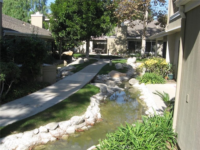 3431 Timber Lk Unit 46, Costa Mesa, CA 92626 - view of yard featuring a small pond
