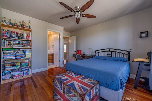 bedroom with connected bathroom, hardwood / wood-style flooring, and ceiling fan