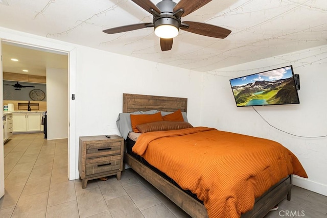 tiled bedroom featuring ceiling fan