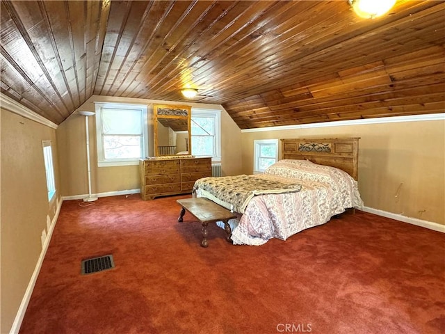 carpeted bedroom featuring lofted ceiling and wooden ceiling