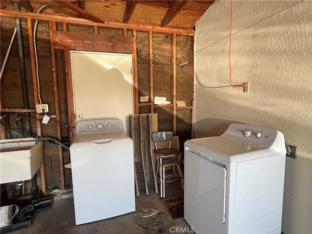 laundry room with independent washer and dryer