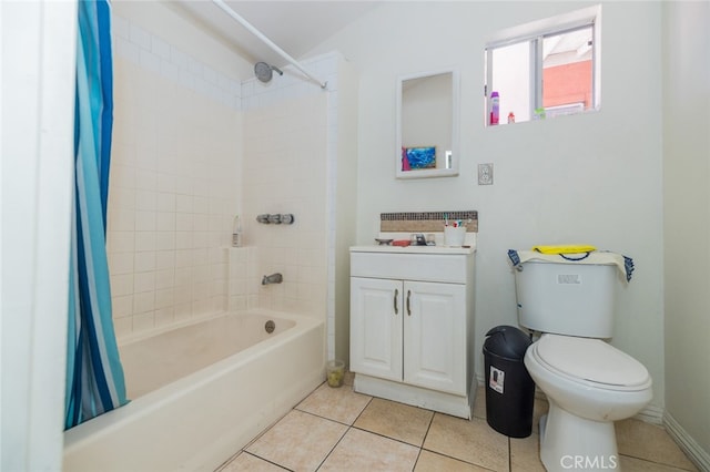 full bathroom with toilet, tile patterned flooring, vanity, and shower / tub combo