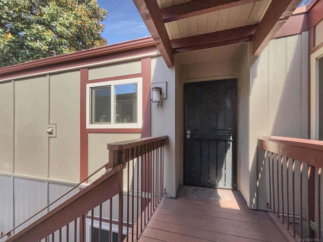 doorway to property featuring a balcony