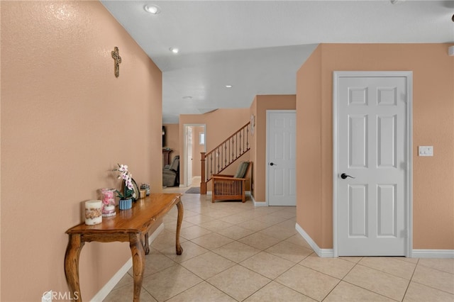 hallway with light tile patterned flooring