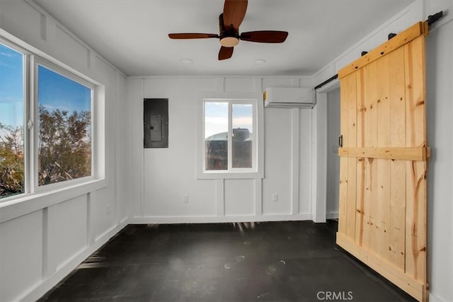 unfurnished room featuring an AC wall unit, electric panel, and ceiling fan