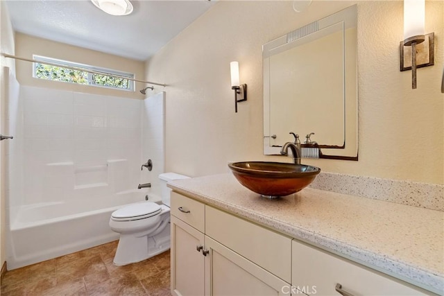 full bathroom with vanity, bathtub / shower combination, and toilet