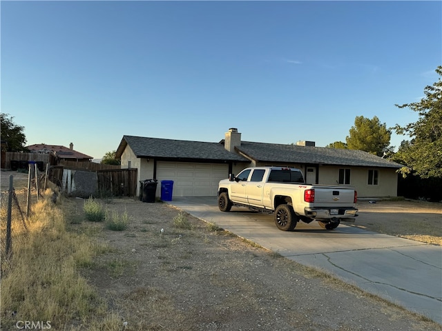 view of front of home with a garage