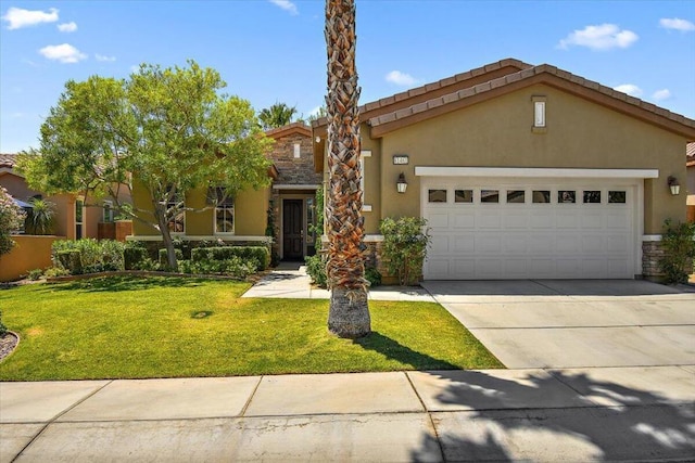 view of front of property with a front lawn and a garage