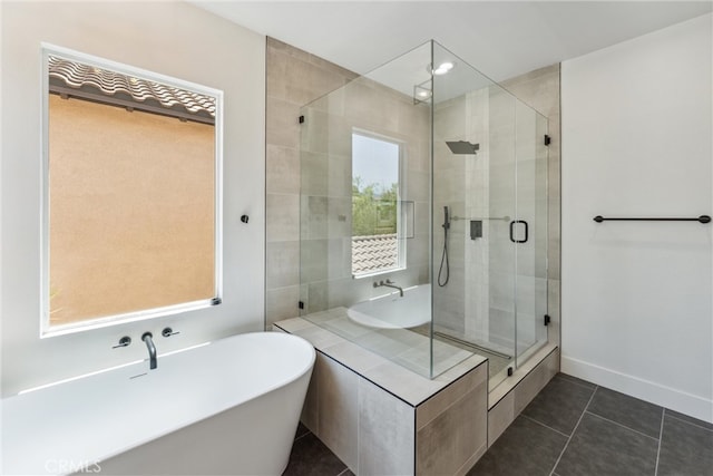 bathroom featuring separate shower and tub, plenty of natural light, and tile patterned floors