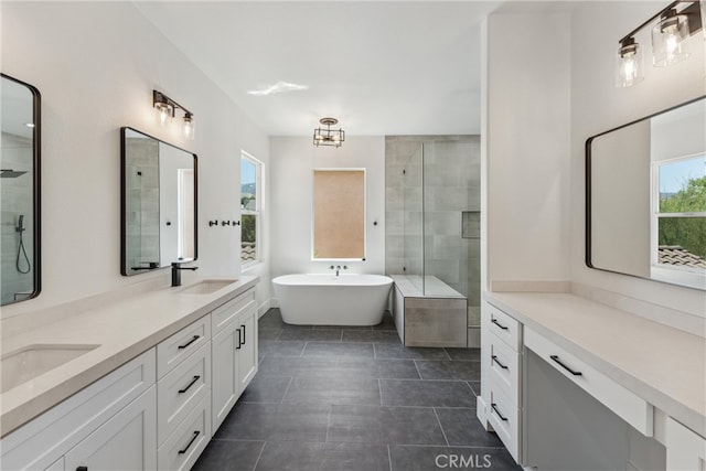 bathroom featuring vanity, separate shower and tub, and tile patterned floors