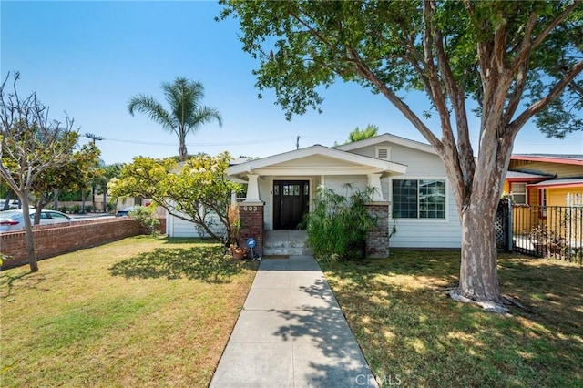 view of front of home with a front yard