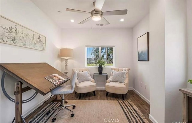 office space with ceiling fan and dark wood-type flooring