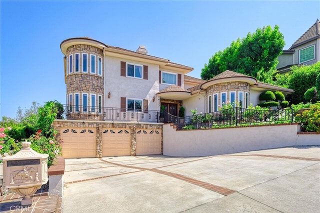 view of front of home with a garage