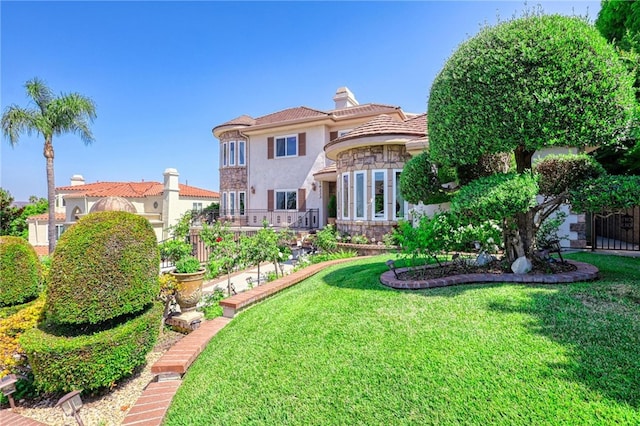 exterior space featuring a front yard