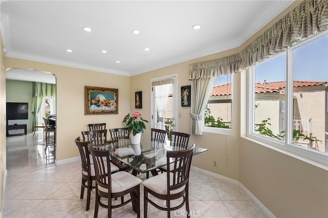 tiled dining area with crown molding