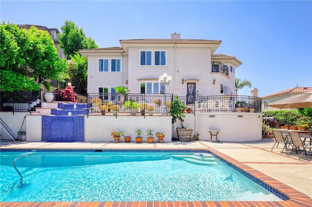 view of pool with a patio