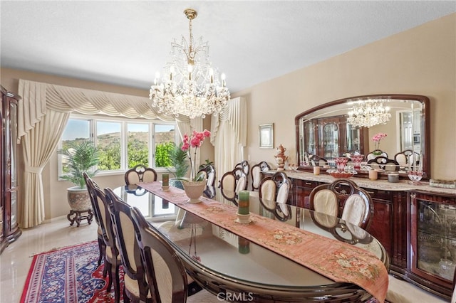 dining space featuring a chandelier