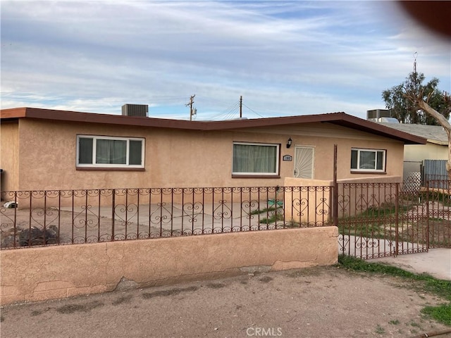 view of property exterior featuring central AC unit