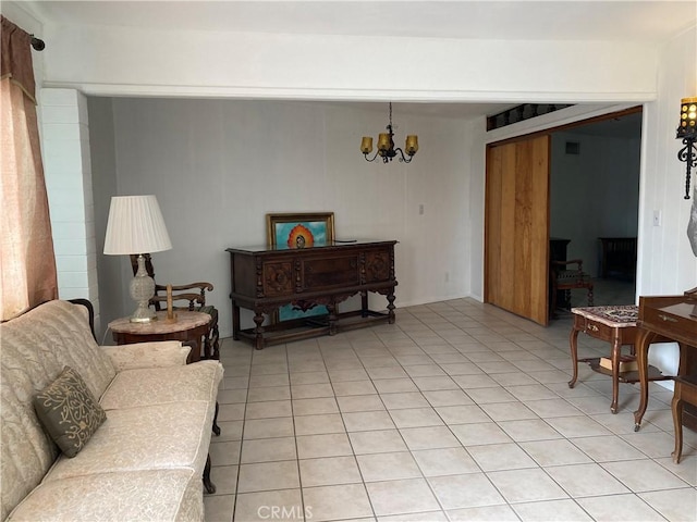 interior space with a chandelier and light tile patterned floors