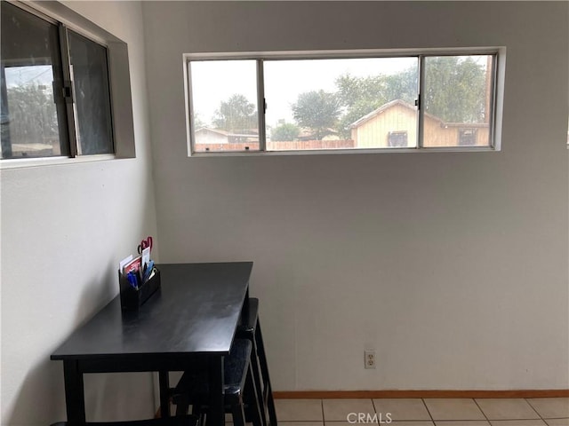 dining room with light tile patterned floors