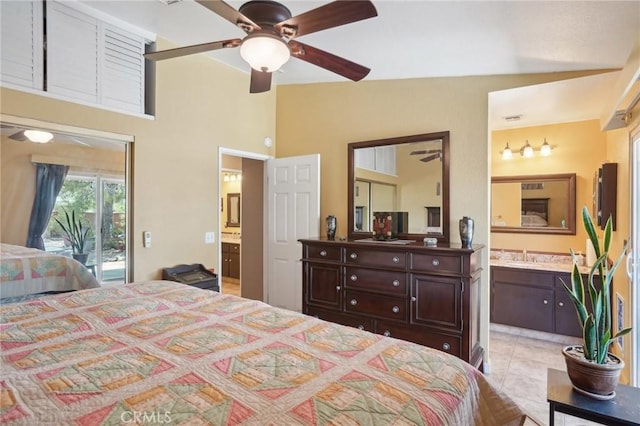 bedroom featuring access to outside, sink, ceiling fan, light tile patterned floors, and connected bathroom