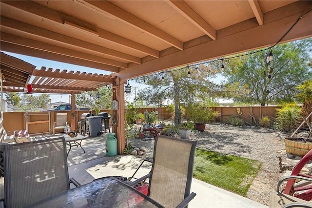 view of patio featuring a shed