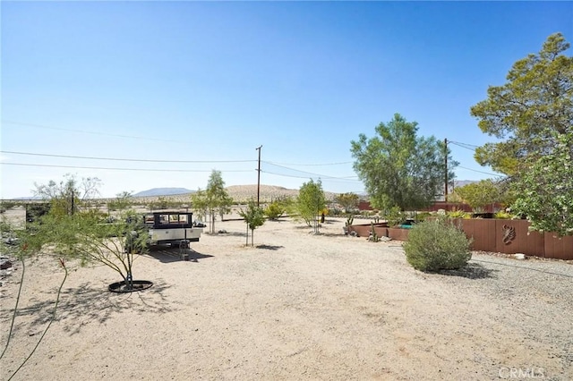 view of yard with a mountain view