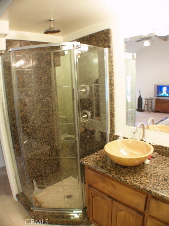 7003 Pioneer Dr, Grizzly Flats, CA 95636 - bathroom featuring tile patterned floors, vanity, and a shower with shower door