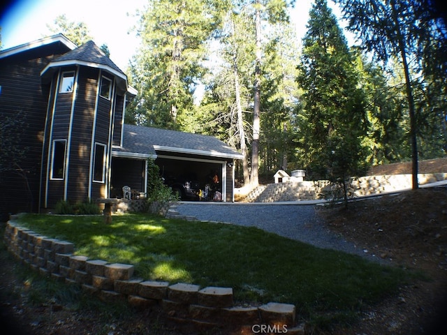 view of yard with a garage