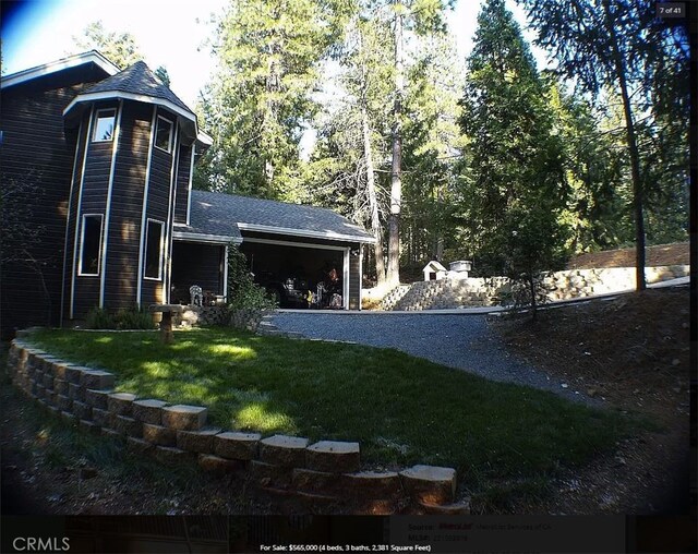7003 Pioneer Dr, Grizzly Flats, CA 95636 - view of yard featuring a garage
