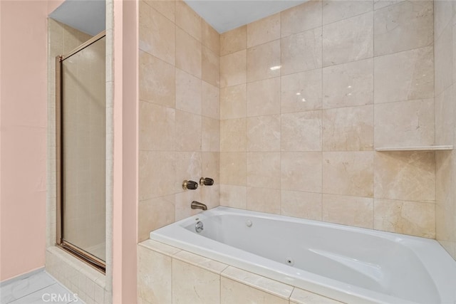 bathroom featuring plus walk in shower and tile patterned floors