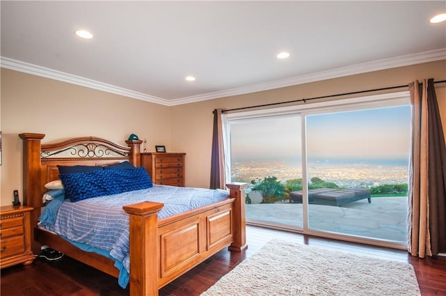 bedroom featuring ornamental molding, dark hardwood / wood-style floors, and access to outside