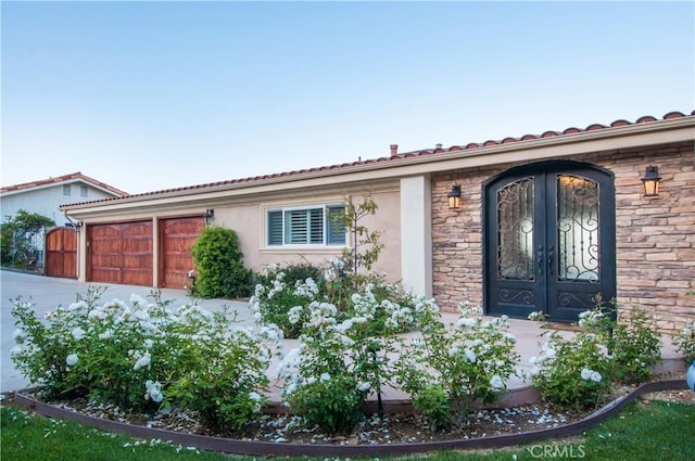 property entrance with french doors