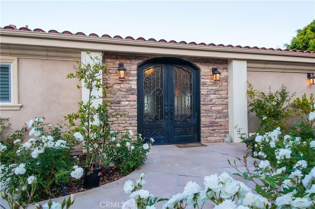 property entrance with french doors